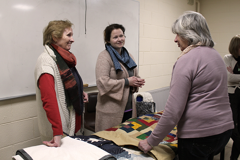 Apple Tree Crafts owners Marie and Trina O'Mahoney talk to Guild Members