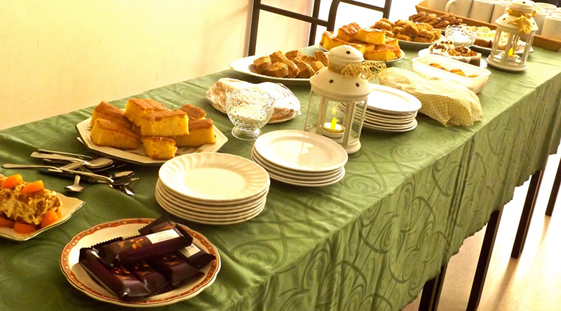 Tea and cakes laid on a table at ICA Wicklow Town Guild