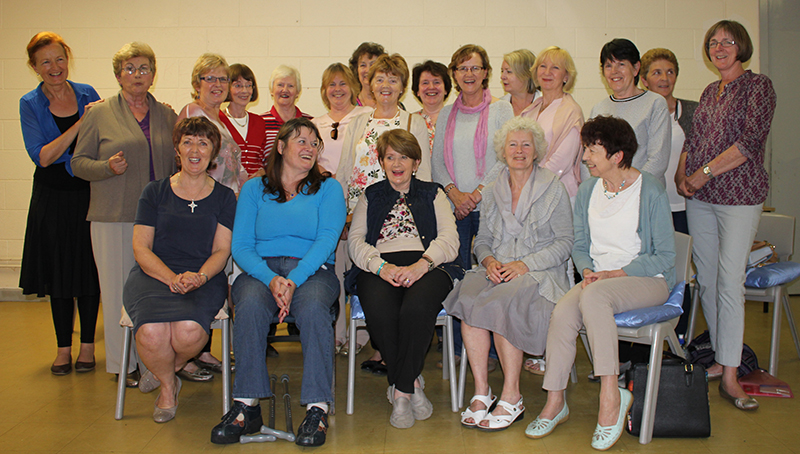 Guild Members laugh with Mary DeCourcy