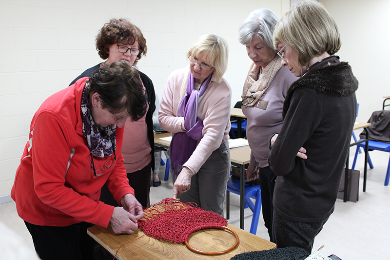 Statia demonstrates macrame to Guild members